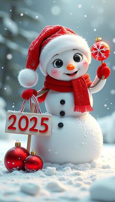 a snowman with a red hat and scarf holding a christmas ornament