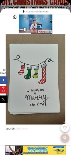 a christmas card with stockings hanging from the clothes line and an advertise for it