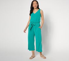 Jump on the jumpsuit trend... Wide cropped legs and an easy breezy sleeveless top give this belted beauty a carefree casual style that exudes comfort and confidence simultaneously. We predict that this fashion statement is here to stay! From Denim & Co.® Fashions. Casual Belted V-neck Jumpsuits And Rompers, Belted Jumpsuits And Rompers For Spring Vacation, Trendy Summer Jumpsuits And Rompers With Elastic Waistband, Belted V-neck Jumpsuits And Rompers For Vacation, Belted V-neck Jumpsuit For Vacation, V-neck Belted Jumpsuits And Rompers For Vacation, Spring Belted Jumpsuits And Rompers For Day Out, Sleeveless Belted Jumpsuits And Rompers For Day Out, Casual V-neck Belted Jumpsuits And Rompers