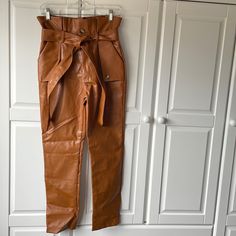 Nwot. Wrinkled From Being Folded In Bag. Trendy Brown Leather Pants With Pockets, Brown Paperbag Waist Bottoms For Work, Fall Paperbag Waist Pants With Pockets, Brown Faux Leather Bottoms With Belt Loops, Brown Paperbag Waist Pants For Fall, Chic Brown Paperbag Waist Pants, Brown Faux Leather Pants With Belt Loops, Trendy Brown Pants With Belt Loops, Fall Paperbag Waist Belted Pants