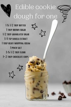 an ice cream dessert in a jar with chocolate chips and cookie dough for one on top