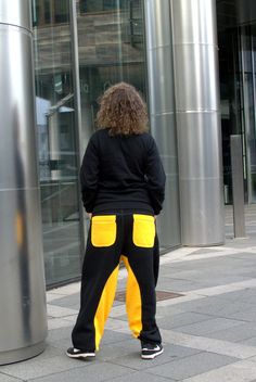 Black&Yellow sweatpants for man or woman. These cozy, warm, comfy sweatpants are perfect for chilling out round the house or going for a walk :) You'll never want to take off your cozy pants ;) Unique baggy fit. Two ventilate pockets in front, back pocket, secret pocket. HQ-Heavy duty material. Density - 280g/m2. Made in EU. SizeLength (in/cm)Waist (in/cm)Loose (in/cm)Stretch (in/cm)Recommended Height(in/cm) XS40/10112/3012/3014/3661/155 S41/10513/3212/3015/3765/165 M42/10713/3412/3115/3869/ Baggy Hip Hop Joggers For Gym, Loose Fit Hip Hop Joggers For Gym, Hip Hop Sweatpants With Pockets For Gym, Urban Baggy Sweatpants With Hip Pockets, Hip Hop Style Baggy Jogging Pants, Athleisure Relaxed Fit Harem Pants For Streetwear, Baggy Hip Hop Joggers, Yellow Cotton Sports Pants, Yellow Sweatpants With Pockets For Streetwear