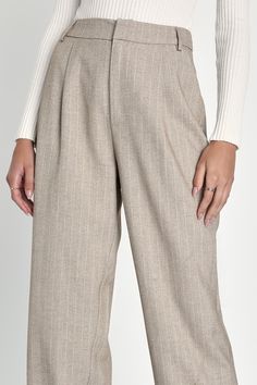 Everyone will take notice when you walk in wearing the Lulus Professionally Posh Beige and White Pinstriped Wide-Leg Pants! Midweight woven fabric, with pinstripes throughout, shapes these pants that have a high waist, belt loops, and front diagonal pockets. Back boasts two decorative welt pockets, atop wide legs that fall to ankle-grazing hems. Hidden zip fly with top clasp closure. Fit: This garment fits true to size. Length: Ankle length. Size medium Inseam: 29.00 Front Rise: 13.00 Waist: Fit Classic Tapered Leg Bottoms With Vertical Stripes, Classic Straight Pants With Vertical Stripes, High Waist Bottoms With Vertical Stripes For Business Casual, High Waist Vertical Stripes Bottoms For Business Casual, Straight Pants With Vertical Stripes For Business Casual, Striped Bottoms For Business Casual Fall Season, Fall Season Striped Bottoms For Business Casual, Fall Striped High-waisted Pants, Striped Trousers For Business Casual