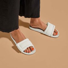 The Sunbeam Slide is the epitome of casual comfort, perfect for daily wear whether you're lounging at your local café or heading to the beach.  Featuring adjustable puffy straps, this slide provides cushioned comfort and lightweight support, so each step is effortless. It's also made with water-friendly materials, ensuring it suits whatever your day brings. Key Features: Comfortable Fit: Features stylish puffy straps with velcro adjustability, providing a snug, customizable fit that combines com Comfortable Slides For Everyday Spring Wear, Comfortable Everyday Slides For Spring, Spring Everyday Slides, Casual Everyday Slides, Trendy Slides For Leisure In Spring, Trendy Slides For Spring Leisure, Trendy Lightweight Slides, Comfortable Sandals For Leisure, Comfortable Slides For Leisure In Spring