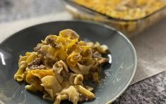 a plate that has some kind of food on it and is next to a casserole dish