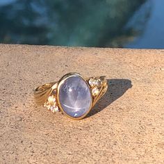 Gorgeous Light Blue Almost Lavender Natural Star Sapphire Ring. Very Heavy Gold Setting With 6 Round Cut Round Diamonds. Opalescent Sapphire Engagement Ring, Star Sapphire Ring Vintage, Star Sapphire Engagement Ring, Blue Star Sapphire Ring, Blue Wedding Rings, Star Sapphire Ring, Blue Star Sapphire, Sapphire Wedding Rings, Star Sapphire