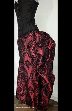 Corset: 20 grommets in back. Back lacing. 14 bones. Classic Victorian WINE AND BLACK damask pattern skirt is gathered in back to give a fabulous full look. Taffeta fabric. Can be worn down in front or you can tie it up to show your legs. (We sell the chains to give this look). Waistband is elastic. Message me at time of purchase with your exact size or bust/waist/height measurements for a better fit. FOR WAIST MEASUREMENT, MEASURE AT SKINNIEST PART OF YOUR WAIST, JUST ABOVE NAVEL. Black Satin Corset, Victorian Cosplay, Outfit Costume, Bustle Skirt, Satin Corset, Steampunk Clothing, Full Look, Cosplay Dress, Damask Pattern