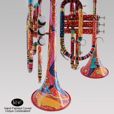 an artisticly designed musical instrument is shown in this advertisement for hand painted cornets