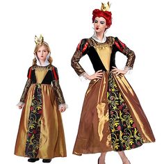 two women dressed in costumes standing next to each other