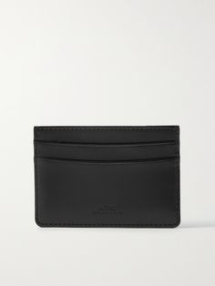 A.P.C.'s cardholder is minimal and sleek. It's made from smooth black leather and debossed with logo-branding. Designer Leather Card Holder For Everyday Use, Classic Business Wallet With Engraved Logo, Classic Business Wallets With Engraved Logo, Classic Wallets With Embossed Logo, Classic Formal Card Holder With Engraved Logo, Classic Leather Wallets With Engraved Logo, Classic Black Wallet With Engraved Logo, Modern Black Card Holder With Engraved Logo, Minimalist Leather Card Holder For Business