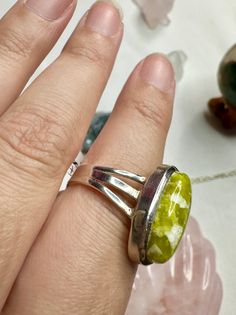 🌟 Welcome to Shine Bright Crystals! 🌟 Stay in the loop with our latest arrivals and thrilling giveaways by following us on Instagram: @ShineBrightCrystals 📏 Approximate Size: 8 Discover the allure of our handcrafted Lizardite sterling silver ring, size 8. This unique green gemstone jewelry piece is perfect for adding a touch of elegance to any outfit. Ideal as a statement ring or a thoughtful gift for her, this natural stone ring is designed to impress. 🌟 Handcrafted Design: Each ring is meticulously crafted to highlight the natural beauty of the Lizardite gemstone. 💚 Unique Green Gemstone: The Lizardite stone features a stunning green hue, making each ring one-of-a-kind. 👗 Elegant Statement Piece: Perfect for special occasions or everyday wear, this ring adds a sophisticated touch t Handmade Green Crystal Ring For Healing, Adjustable Green Rings With Large Stone, Green Crystal Ring With Large Stone For Gift, Adjustable Green Ring With Large Stone, Handmade Adjustable Oval Crystal Ring, Adjustable Green Jewelry With Large Stone, Adjustable Crystal Ring With Large Stone, Adjustable Crystal Ring With Large Stone For Gift, Adjustable Green Turquoise Ring As Gift