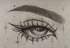 a drawing of an eye with long lashes and stars in the background, drawn on paper