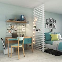 a bedroom with a bed, desk and chair next to a wall mounted bookshelf