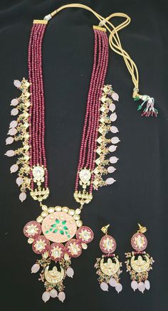 Long Kundan necklace set with earrings/Ruby pink long rani haar/Indian Jewelry/Pakistani Jewelry/ Pakistani Necklace * This Jewelry set would add more charm to your beautiful jewelry collection and would surely bring lots of compliments . * Note:- This is an artificial Jewelry Set. * Care Instructions:  Please store the jewelery safely in airtight packaging, away from moisture, water, perfume and chemicals and clean with a soft, dry cloth for long life. **Please note: Returns won't be accepted f Pink Temple Jewelry Necklace With Latkans, Pink Meenakari Necklaces For Festive Occasions, Traditional Pink Kundan Necklace Gift, Pink Meenakari Necklaces For Festivals, Pink Meenakari Necklace For Festivals, Traditional Pink Necklace For Diwali, Hand Set Pink Necklaces For Festive Occasions, Festive Pink Meenakari Necklace, Traditional Pink Necklaces For Festivals