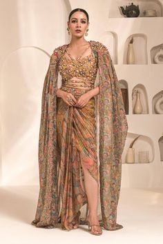 Yellow and multi colored printed cape with hand embellishments. Comes with coordinating draped dhoti skirt and hand embellished bustier. - Aza Fashions Dhoti Skirt, 6 July, Indo Western, Traditional Wear, Draped Fabric, Skirt Pattern, Set For Women, Western Wear, Aza Fashion