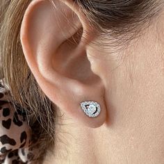 With dazzling cubic zirconia, these halo stud earrings are a must-have accessory. With dazzling cubic zirconia, these halo stud earrings are a must-have accessory.Click on this JEWELRY & WATCHES GUIDE to learn about fit, styles, materials and more! FEATURES Length: 11 mm x 8 mm Backings: post Nickel free Metal: brass Plating: rhodium Finish: polished Packaging: pouchSTONE DETAILS Stone type: cubic zirconia Shape: round, pear Setting: pave Gemstones may have been treated to enhance their appearan Cubic Zirconia Cluster Earrings With Halo Setting, Silver Halo Cubic Zirconia Diamond Earrings, Silver Cubic Zirconia Diamond Earrings With Halo, Cubic Zirconia Cluster Earrings With Halo Design For Anniversary, Anniversary Halo Cluster Earrings With Cubic Zirconia, Party Halo Setting Cubic Zirconia Earrings, Party Cubic Zirconia Halo Setting Earrings, Party Earrings With Halo Setting In Cubic Zirconia, Party Cubic Zirconia Earrings With Halo Setting