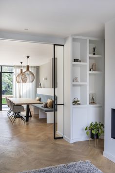 a living room filled with furniture and a fire place