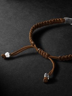 EXCLUSIVE AT MR PORTER. Elhanati's bracelet is the sort of style that'll become an everyday signature. Strung from woven brown cord, it features an ID bar made from the brand's signature hammered white gold. Wear yours solo or next to similar styles. Emerald Bracelet Gold, Leather Cord Bracelets, Mens Gold Jewelry, Emerald Bracelet, Cord Bracelet, Fine Jewelry Bracelets, Bracelet For Men, Latest Jewellery, White Gold Jewelry