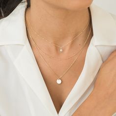 Our Dainty Initial Necklace will be your next favorite necklace - it’s simple, minimal, and so versatile! Make it your own by wearing a loved one’s initials or your own initial. It also makes the perfect personalized gift for a new mama, your bridesmaids, your friend’s birthday, and everyone else you love. You can wear it every day - yes, even in the shower and to sleep! DETAILS 14k gold filled -or- sterling silver necklace Necklace length: 16" with 2" extender Coin diameter: 9mm Safe for sensit Dainty Initial Necklace, Evening Dinner, Solid Gold Bracelet, Solitaire Necklace, Detailed Necklace, Sterling Silver Initial, Layered Necklace Set, Diamond Jewelry Necklace, Solid Gold Necklace