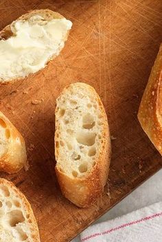 several pieces of bread on a cutting board