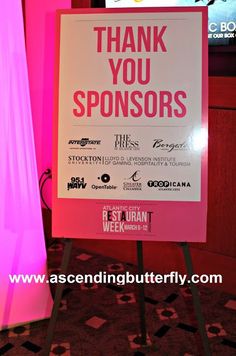 a sign that says thank you sponsors in front of a pink background with black and white lettering