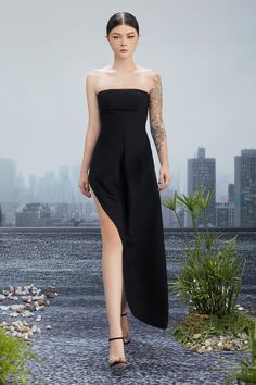 Crafted from a luxurious blend of wool and cotton, this ankle-length piece features a unique asymmetric design and functional patch pockets. Effortlessly chic and versatile, it's the perfect addition to any fashion-forward collection. *The length is measured from the chest to the hem. Fitted Asymmetrical High-low Hem Evening Dress, Evening Fitted Maxi Dress With High-low Hem, Fitted Evening Maxi Dress With High-low Hem, Formal Fitted Maxi Dress With High-low Hem, Chic Fitted Maxi Dress With High-low Hem, Black Asymmetrical Dress For Work, Fitted High-low Hem Asymmetrical Cocktail Dress, Fitted Asymmetrical High-low Cocktail Dress, Fitted Asymmetrical Cocktail Dress With High-low Hem