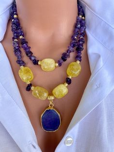 Raw Amethyst and Citrine Layered Necklace Set with Agate Pendant This elegant necklace set is a great gift for yourself and your loved ones. Made from natural crystal beads. All metal ornaments are gold plated and won't get darker in time! FREE SHIPPING - All orders get shipped within 1-2 business days. - 5-10 days of delivery time Returns are allowed 14 days after the delivery, however, the cost of delivery lies on the buyer. For more bracelets and necklaces!: https://finecrystalsdesign.etsy.co Yellow Gemstone Beaded Necklaces As Gift, Yellow Gemstone Beaded Necklace For Gifts, Yellow Crystal Gemstone Bead Necklace For Gifts, Yellow Amethyst Jewelry Gift, Yellow Double Strand Jewelry As Gift, Yellow Double Strand Jewelry For Gift, Amethyst And Citrine, Unique Statement Necklace, Ocean Inspired Jewelry