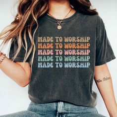 "Are you looking for a tshirt that's not only stylish but also showcases your faith? Look no further than our Made to worship shirt.  Featuring an eye-catching retro design, this Psalm 95 Faith Shirt is sure to turn heads and inspire conversations about faith wherever you go. Whether you're running errands, attending a church event, or just lounging at home, this trendy Christian tshirt is the perfect choice. And it's not just for you - it also makes a fantastic gift for friends and family who share your passion for Christ. Spread the message of hope and faith with this inspiring retro christian t-shirt. Order yours today!                                 ＊𝗡𝗢𝗧 𝗔𝗩𝗔𝗜𝗟𝗔𝗕𝗟𝗘 𝗜𝗡 𝗦𝗧𝗢𝗥𝗘𝗦＊ 👚 GET TO KNOW YOUR MADE TO WORSHIP SHIRT This Made To Worship Shirt is printed on a Comfor Psalm 95, Made To Worship, Church Shirt, Christian Tshirt, Christian Stuff, Faith Shirt, Christian Shirt, Comfort Colors Shirt, Christian Shirts