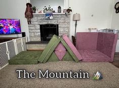 a living room filled with furniture and a flat screen tv