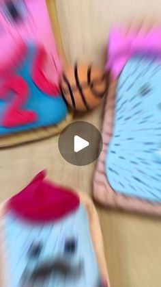 four different colored shoes are shown in this motion blurry image, and the video appears to be blurred