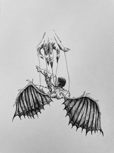 a black and white drawing of a demon on a person's back with two wings