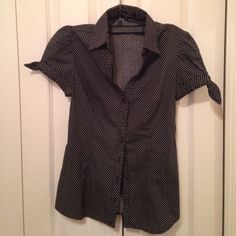 Only Worn A Few Times. Looks Brand New Very Cute Black And White Polka Dot Button Up. Has Adorable Bows On Each Short Sleeve. Retro Black Button-up Blouse, Polka Dot Blouse With Button Closure For Workwear, Polka Dot Tops With Button Closure For Workwear, Polka Dot Workwear Top With Button Closure, Casual Polka Dot Blouse With Buttons, Polka Dot Cotton Blouse With Button Closure, Polka Dot Cotton Tops With Buttons, Fitted Polka Dot Button-up Blouse, Fitted Button-up Blouse With Polka Dot Pattern