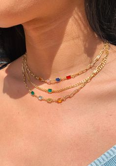 Unleash your vibrant style with our Multicolor Gemstone Gold Filled Paperclip Necklace. This captivating piece showcases a modern paperclip or curb chain design adorned with an array of dazzling gemstone(s) in a variety of vivid hues. Each gemstone adds a pop of color, creating a mesmerizing visual appeal that effortlessly complements any outfit. Chain Length: 16" + 2" Extension Our best selling Gold filled Gemstone Necklace! The perfect addition to layering with other dainty gold chains. Chain Colored Chain Necklace, Layering Jewelry Necklaces, Gold Necklace Layered Aesthetic, Colorful Jewelry Aesthetic, How To Layer Necklaces, Paperclip Necklace, Vibrant Style, Necklace Birthstone, Jewelry Dainty