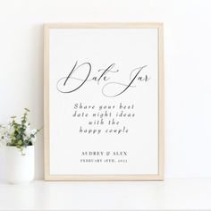 a white framed print with the words, date for