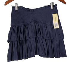 Nwt Jondie Smocked Waist Ruffled Mini Skirt, Size Small, Navy, Approximate Measurements: Waist 28 Inches, Length 13.5 Inches Smoke-Free Home. Casual Tiered Skirt With Smocked Back, Casual Blue Ruched Skirt, Casual Mini Skirt With Smocked Bodice And Flowy Fit, Casual Skirt With Smocked Bodice, Casual Mini Skirt With Smocked Bodice, Casual Blue Skirt With Smocked Bodice, Casual Blue Skirt With Smocked Back, Casual Tiered Ruched Skirt, Casual Smocked Bodice Mini Bottoms