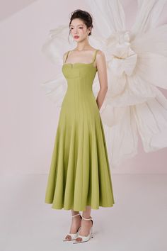 Indulge in the ultimate vacation style with our dress. Featuring a flattering A-line silhouette and elegant draping, this dress is perfect for any sandy destination. Made with lightweight and flowy crepe fabric, it will keep you cool and comfortable all day long. Avocado Green Dress, Green Dress Outfit, Crepe Midi Dress, Draped Midi Dresses, Calf Length Dress, Avocado Green, Vacation Style, Crepe Fabric, Womens Midi Dresses