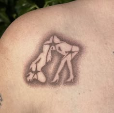 a person with a tattoo on their shoulder