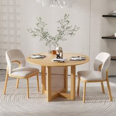 a round table with four chairs around it