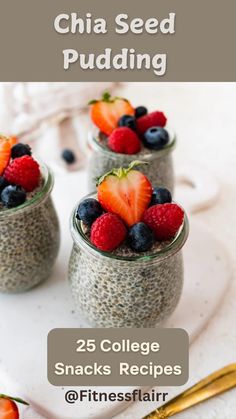 chia seed pudding with strawberries and blueberries in small glass jars on a white table