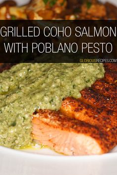 grilled coho salmon with poblano pesto on a white platter