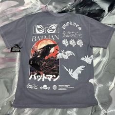 a batman t - shirt with bats on it