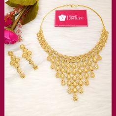 24 carat gold plated Kuwaiti necklace set with earrings. A best replica of original gold sets. 100% real look. Perfect for any occasion. More variety on our shop. For any enquiries feel free to contact us. Please provide detailed address with contact number when order is placed as it is required on shipping label. Gold Hallmarked Kundan Necklace For Diwali, Bollywood Style Hallmarked Gold Necklace, Gold Plated Jewelry Sets For Formal Diwali Occasions, Gold Chandbali Necklace With Elegant Design, Gold Plated Round Jewelry Sets For Festivals, Gold Plated Jewelry Sets For Festivals, Formal Gold Plated Jewelry Sets For Diwali, Gold Bollywood Jewelry Sets Hand Set, Gold Bollywood Hand Set Jewelry