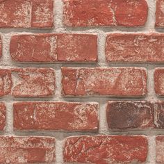 an old brick wall is shown in this image