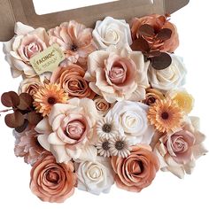 a cardboard box filled with lots of flowers