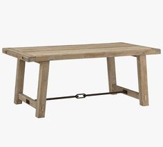 a wooden table with metal legs on a white background