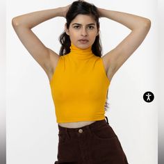 Los Angeles Apparel Turtleneck Sleeveless Crop Top Xs In Mustard Trendy Yellow Sleeveless Top, Trendy Yellow Vest Top, Trendy Yellow Sleeveless Halter Top, Fitted Yellow Halter Top Casual, Fitted Yellow Halter Top, Yellow Sleeveless Vest Top, Yellow Stretch Vest, Yellow Sleeveless Casual Crop Top, Trendy Sleeveless Crop Top