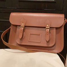 The Cambridge Satchel Company Bag With White Stitching And A Brass Buckle. Unused/Unworn Very Classic Piece, Cognac Brown. 13.5” Wide 10” Tall Cambridge Bag, Company Bag, Cambridge Satchel, Cambridge Satchel Company, Brass Buckle, Bag Style, Cambridge, Cognac, Satchel