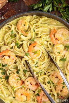 pasta with shrimp and parsley in a skillet