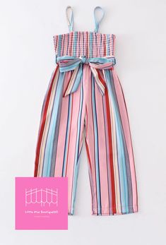 "\"Add a pop of color to your kid's wardrobe with our multicolored girls smocked striped jumpsuit. Featuring a smocked design and adjustable straps for a comfortable fit, this jumpsuit is perfect for all-day play.\" **Usually fits true to size** **Material 100% Polyester** **Machine Wash cold tumble dry low iron isn't recommended**" Spring Playful Multicolor Jumpsuits And Rompers, Playful Multicolor Jumpsuits And Rompers For Spring, Casual Multicolor Jumpsuits And Rompers With Elastic Waistband, Casual Pink Jumpsuits And Rompers With Elastic Waistband, Girls Smock, Kids Wardrobe, Striped Jumpsuit, Girls Clothing Sets, Clothing Sets