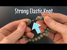 two hands holding beads with the words strong elastic knot on them and an arrow pointing to it